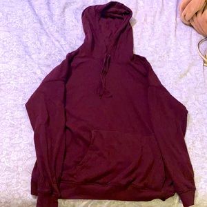 A maroon hoodie.
